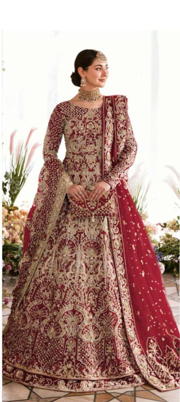 ?Minha? is all about delicacy personified on a nude colored net pishwas, which exhibits heavenly embellished geometric and floral patterns, adorned with rich, magnificent details. Paired with a silk lehanga, with fully embellished exquisite border along with delicately paired with organza dupatta with four sided embellished border and extended pallu and booti spray. Moreover, a beautiful light champagne luxe net veil with pearls spray and four-sided intricate border has been added to give a goddess look to 