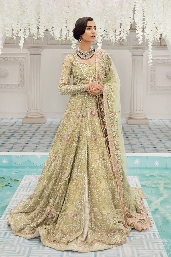 Suffuse bridal couture Pakistani indian bridal wedding dress mehndi nikkah suit usa uk australia canada europe Germany bridesmaid trending dresses guest luxury womens wear gift for her pakistani indian designer dreses
Indulge in the splendor of 'Resmin' Lehenga Set, bathed in a delicate blush pink hue. This artful craftsmanship is enveloped in timeless beauty with iridescent sequins, lustrous crystals &amp; glistening milky pearls. The ombre lehenga &amp; shirt stand as a divine embodiment of time-honored e